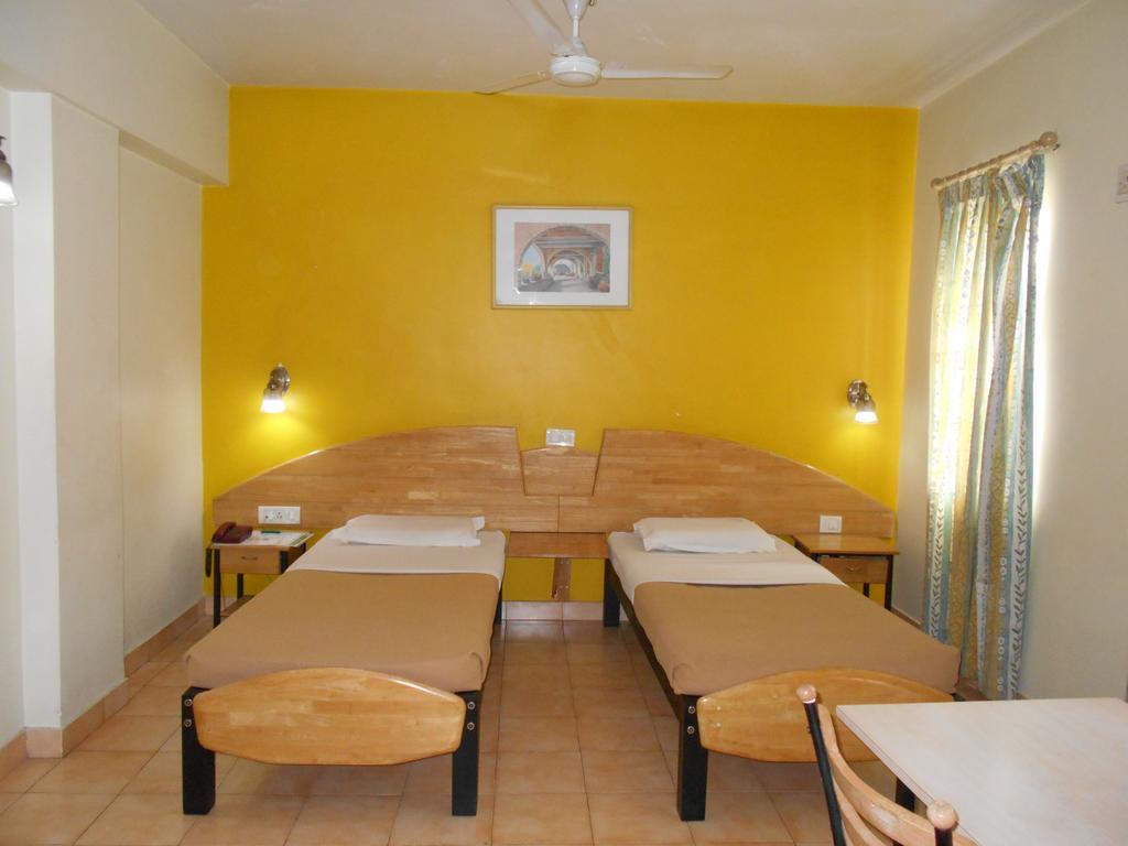 Tom'S Hotel Bangalore Habitación foto