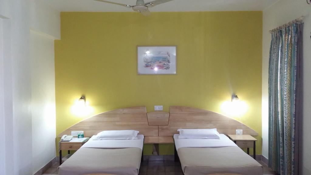 Tom'S Hotel Bangalore Habitación foto