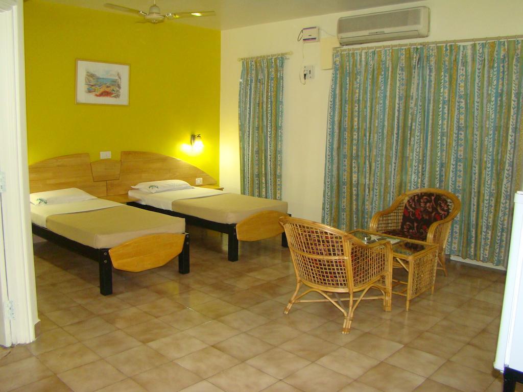 Tom'S Hotel Bangalore Habitación foto